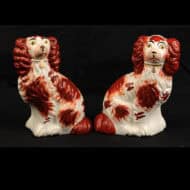 Pair of Red and White Dogs