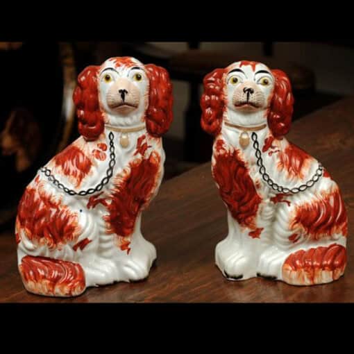Pair of Red and White  Dogs